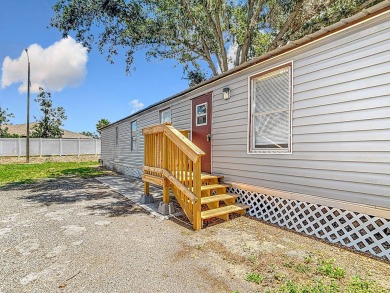 (Ver abajo en espanol)  All Ages Community - Lot rent $850 on Diamond Hill Golf and Country Club in Florida - for sale on GolfHomes.com, golf home, golf lot