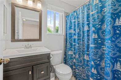 Exquisite 4BR/4BA pool home nestled on a private cul-de-sac in on Weston Hills Country Club in Florida - for sale on GolfHomes.com, golf home, golf lot