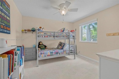 Exquisite 4BR/4BA pool home nestled on a private cul-de-sac in on Weston Hills Country Club in Florida - for sale on GolfHomes.com, golf home, golf lot
