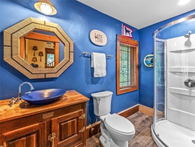 This impressive home boasts a distinctive yet captivating on Lake Toxaway Country Club in North Carolina - for sale on GolfHomes.com, golf home, golf lot