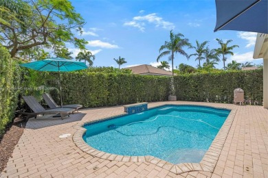 Exquisite 4BR/4BA pool home nestled on a private cul-de-sac in on Weston Hills Country Club in Florida - for sale on GolfHomes.com, golf home, golf lot