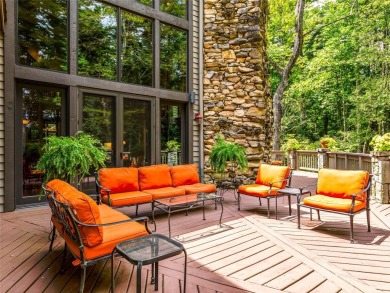 This impressive home boasts a distinctive yet captivating on Lake Toxaway Country Club in North Carolina - for sale on GolfHomes.com, golf home, golf lot