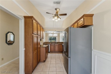 Enjoy breathtaking lake views from this inviting 2-bedroom on Cross Creek Country Club in Florida - for sale on GolfHomes.com, golf home, golf lot