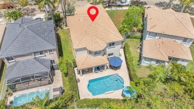 Exquisite 4BR/4BA pool home nestled on a private cul-de-sac in on Weston Hills Country Club in Florida - for sale on GolfHomes.com, golf home, golf lot