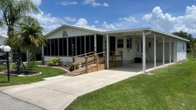 This home is located in the upscale 55+ gated community - The on Sabal Springs Golf and Racquet Club in Florida - for sale on GolfHomes.com, golf home, golf lot