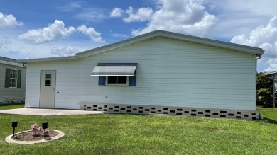 This home is located in the upscale 55+ gated community - The on Sabal Springs Golf and Racquet Club in Florida - for sale on GolfHomes.com, golf home, golf lot