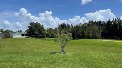 This home is located in the upscale 55+ gated community - The on Sabal Springs Golf and Racquet Club in Florida - for sale on GolfHomes.com, golf home, golf lot