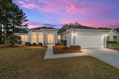 Welcome home and step into this popular Sanibel model on Eagle Ridge At Spruce Creek Country Club in Florida - for sale on GolfHomes.com, golf home, golf lot