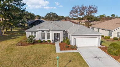 Welcome home and step into this popular Sanibel model on Eagle Ridge At Spruce Creek Country Club in Florida - for sale on GolfHomes.com, golf home, golf lot