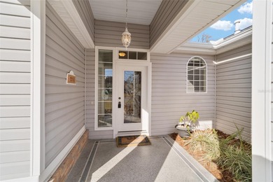 Welcome home and step into this popular Sanibel model on Eagle Ridge At Spruce Creek Country Club in Florida - for sale on GolfHomes.com, golf home, golf lot