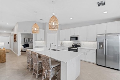 Experience exceptional living in this extraordinary Diangelo on Heritage Landing Golf  in Florida - for sale on GolfHomes.com, golf home, golf lot