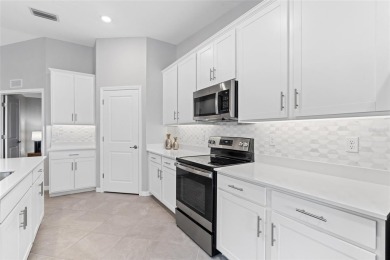Experience exceptional living in this extraordinary Diangelo on Heritage Landing Golf  in Florida - for sale on GolfHomes.com, golf home, golf lot