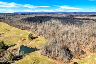 This spectacular property situated on 86 acres features a 9 hole on Morgan Hills in Pennsylvania - for sale on GolfHomes.com, golf home, golf lot