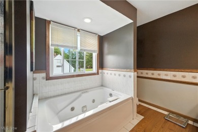 Nestled in the heart of Hudson, this beautifully updated home on Lake Forest Country Club in Ohio - for sale on GolfHomes.com, golf home, golf lot