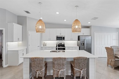 Experience exceptional living in this extraordinary Diangelo on Heritage Landing Golf  in Florida - for sale on GolfHomes.com, golf home, golf lot