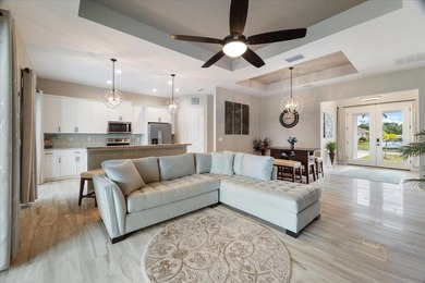 Welcome to your dream home on a freshwater canal in the highly on Pinemoor West Golf Club in Florida - for sale on GolfHomes.com, golf home, golf lot