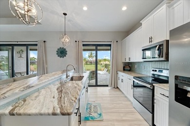 Welcome to your dream home on a freshwater canal in the highly on Pinemoor West Golf Club in Florida - for sale on GolfHomes.com, golf home, golf lot