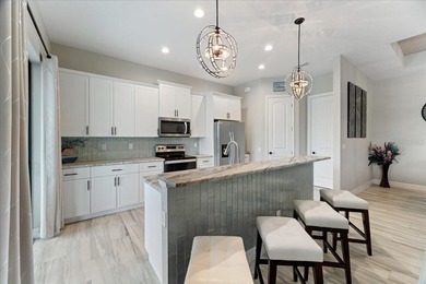 Welcome to your dream home on a freshwater canal in the highly on Pinemoor West Golf Club in Florida - for sale on GolfHomes.com, golf home, golf lot