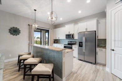 Welcome to your dream home on a freshwater canal in the highly on Pinemoor West Golf Club in Florida - for sale on GolfHomes.com, golf home, golf lot