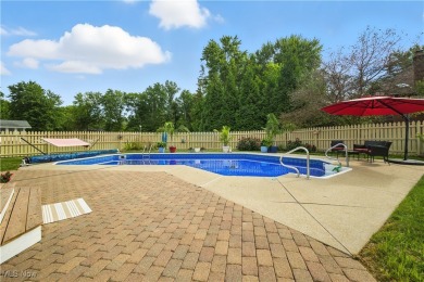 Nestled in the heart of Hudson, this beautifully updated home on Lake Forest Country Club in Ohio - for sale on GolfHomes.com, golf home, golf lot