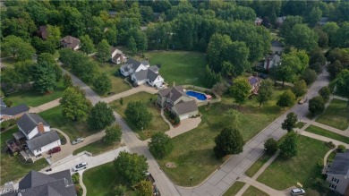 Nestled in the heart of Hudson, this beautifully updated home on Lake Forest Country Club in Ohio - for sale on GolfHomes.com, golf home, golf lot