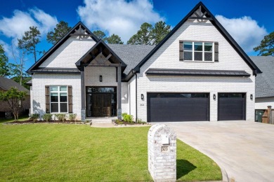 Stunning custom built home in Ensbury. Large open floor plan on Chenal Country Club - Bear Den Mountain in Arkansas - for sale on GolfHomes.com, golf home, golf lot