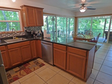 Built for comfort and ease of living, this home on Lake Navajo on Cherokee Village North Course in Arkansas - for sale on GolfHomes.com, golf home, golf lot