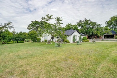 This is the BEST VALUE in Pecan Plantation! Updated 3-2-2 and on Pecan Plantation Country Club in Texas - for sale on GolfHomes.com, golf home, golf lot