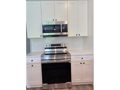 One or more photo(s) has been virtually staged. Under on Duffys Golf Center in Florida - for sale on GolfHomes.com, golf home, golf lot