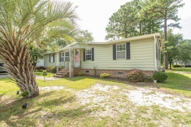 Just a short golf cart ride away from beautiful Garden City on Indigo Creek Golf Club in South Carolina - for sale on GolfHomes.com, golf home, golf lot