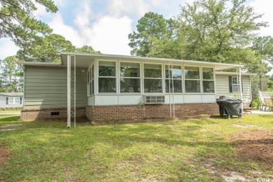 Just a short golf cart ride away from beautiful Garden City on Indigo Creek Golf Club in South Carolina - for sale on GolfHomes.com, golf home, golf lot