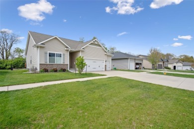 This beautiful Eco friendly ranch home features an inviting open on Woodland Hills Golf in Iowa - for sale on GolfHomes.com, golf home, golf lot