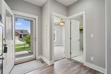 This beautiful Eco friendly ranch home features an inviting open on Woodland Hills Golf in Iowa - for sale on GolfHomes.com, golf home, golf lot