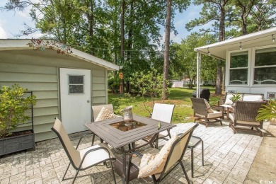 Just a short golf cart ride away from beautiful Garden City on Indigo Creek Golf Club in South Carolina - for sale on GolfHomes.com, golf home, golf lot