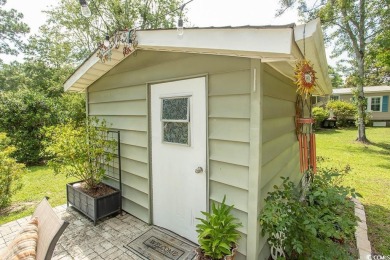 Just a short golf cart ride away from beautiful Garden City on Indigo Creek Golf Club in South Carolina - for sale on GolfHomes.com, golf home, golf lot