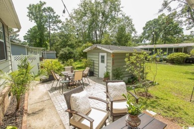 Just a short golf cart ride away from beautiful Garden City on Indigo Creek Golf Club in South Carolina - for sale on GolfHomes.com, golf home, golf lot