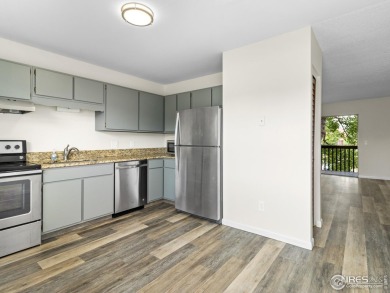 Easy Mountain Living! Kick back and enjoy life in this 2-bedroom on Lake Estes Golf Course in Colorado - for sale on GolfHomes.com, golf home, golf lot
