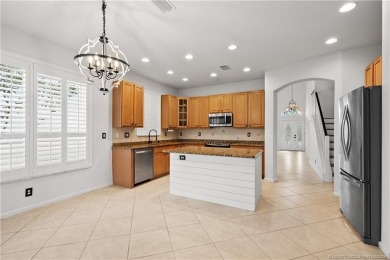 STUNNING 3-bed + bonus loft home in Jensen Beach Country Club on Eagle Marsh Golf Club in Florida - for sale on GolfHomes.com, golf home, golf lot
