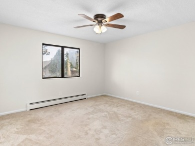 Easy Mountain Living! Kick back and enjoy life in this 2-bedroom on Lake Estes Golf Course in Colorado - for sale on GolfHomes.com, golf home, golf lot