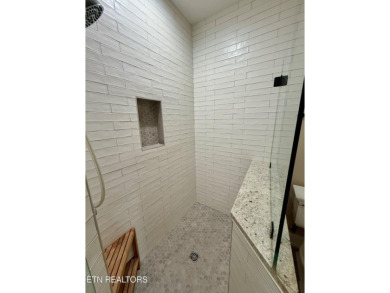 Discover one of the most desirable condos in Rarity Bay on Rarity Bay Country Club - Loudon in Tennessee - for sale on GolfHomes.com, golf home, golf lot