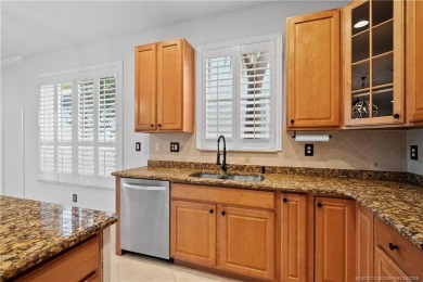 STUNNING 3-bed + bonus loft home in Jensen Beach Country Club on Eagle Marsh Golf Club in Florida - for sale on GolfHomes.com, golf home, golf lot