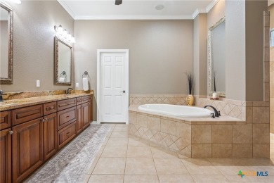 This stunning 5-bedroom, 4.5-bath home sits on over half an acre on Mill Creek Golf Club in Texas - for sale on GolfHomes.com, golf home, golf lot