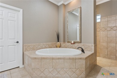 This stunning 5-bedroom, 4.5-bath home sits on over half an acre on Mill Creek Golf Club in Texas - for sale on GolfHomes.com, golf home, golf lot