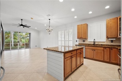 STUNNING 3-bed + bonus loft home in Jensen Beach Country Club on Eagle Marsh Golf Club in Florida - for sale on GolfHomes.com, golf home, golf lot