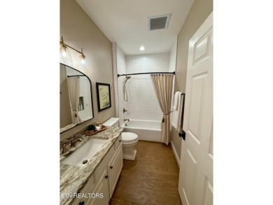 Discover one of the most desirable condos in Rarity Bay on Rarity Bay Country Club - Loudon in Tennessee - for sale on GolfHomes.com, golf home, golf lot