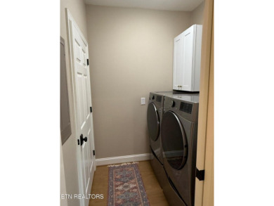 Discover one of the most desirable condos in Rarity Bay on Rarity Bay Country Club - Loudon in Tennessee - for sale on GolfHomes.com, golf home, golf lot