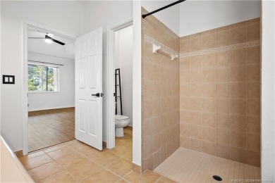 STUNNING 3-bed + bonus loft home in Jensen Beach Country Club on Eagle Marsh Golf Club in Florida - for sale on GolfHomes.com, golf home, golf lot