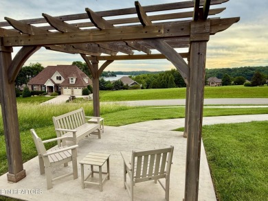 Discover one of the most desirable condos in Rarity Bay on Rarity Bay Country Club - Loudon in Tennessee - for sale on GolfHomes.com, golf home, golf lot