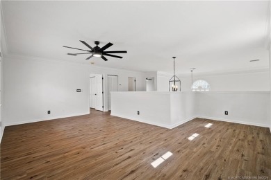 STUNNING 3-bed + bonus loft home in Jensen Beach Country Club on Eagle Marsh Golf Club in Florida - for sale on GolfHomes.com, golf home, golf lot