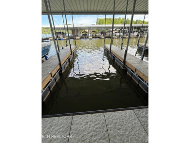 Discover one of the most desirable condos in Rarity Bay on Rarity Bay Country Club - Loudon in Tennessee - for sale on GolfHomes.com, golf home, golf lot
